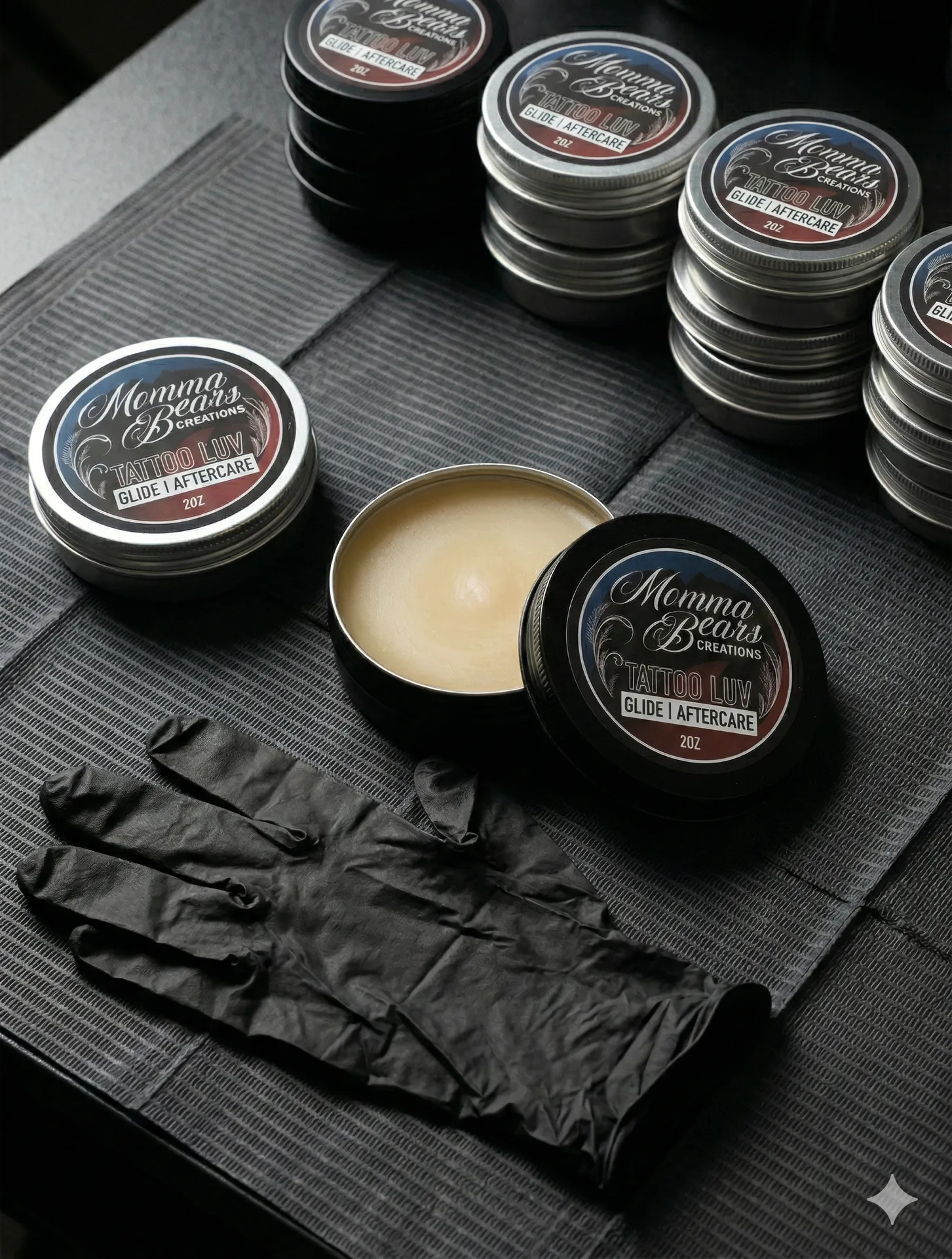 Professional tattoo studio workspace with warm spring light coming through the window